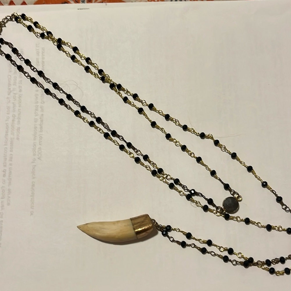 Two tiered necklace with tooth and stone necklace